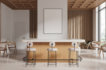 Modern dining area with a blank poster template on the wall above a wooden bar counter in a bright, minimalist interior design space. 3D Rendering