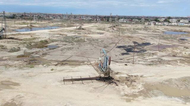 Drone makes semicircle over oil pum