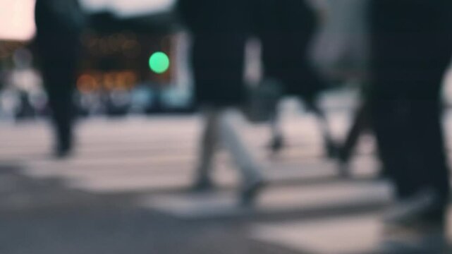Many pedestrians crossing on the road, Umeda in Osaka in Japan, Business or people, Blurred, 4K slow motion