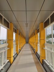 A pedestrian overpass above a highway
