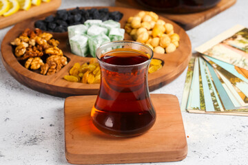 Enjoying traditional tea with snacks in a cozy setting