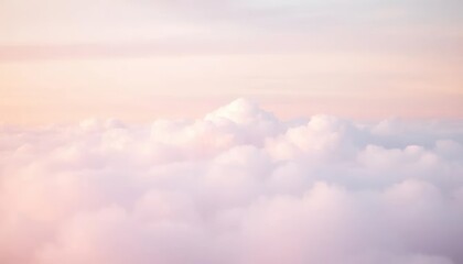 Obraz premium Soft pastel cloudscape at sunrise. Serene and dreamy, perfect for backgrounds or design projects. wallpaper banner background