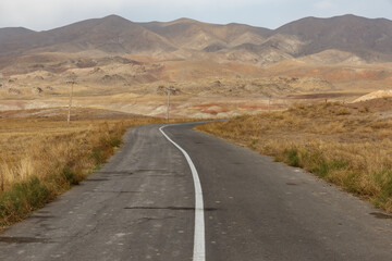 Winding asphalt road through the scenic landscapes of East Azerbaijan Province in Iran