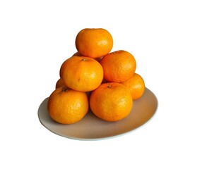 pile of mandarin oranges on the plate