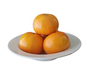pile of mandarin oranges on the plate