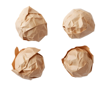 Four crumpled paper balls arranged in a gridisolated on a white background, png transparent , showcasing texture and form.
