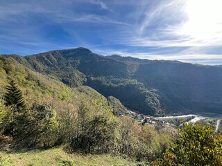Naklejka premium View of the canyon along the Adjaristskali River and the town of Zeda Makhuntseti, Georgia