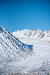 Fototapeta premium Altai Tavan Bogd National Park in Western Mongolia. Majestic snow-capped mountains, glaciers, and dramatic landscapes of Mongolia’s Altai range, showcasing the untouched beauty and wilderness of one o