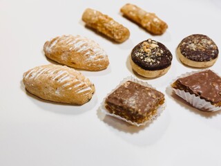 Traditional Arabic Sweets Selection on White Background: A Colorful and Flavorful Feast.