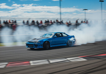 Car, drifting and smoke with speed, action and motorsport for race, competition and sport. Vehicle, automobile and track with power, driving and skill for training, challenge and performance