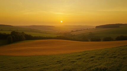 Fototapeta premium Golden Hour Countryside: Serene Sunset over Rolling Hills and Fields