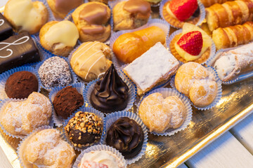 Beautiful typical Italian pastries mix in a tray