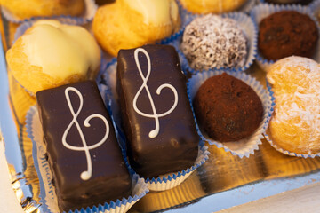 Wonderful typical Italian pastries mix in a tray close-up