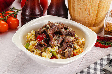 Traditional couscous with beef and vegetables