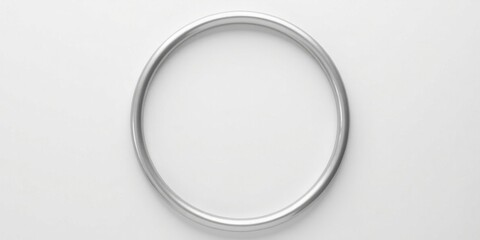 Fototapeta premium A simple silver circular frame on a white background, perfect for minimalist designs or presentations