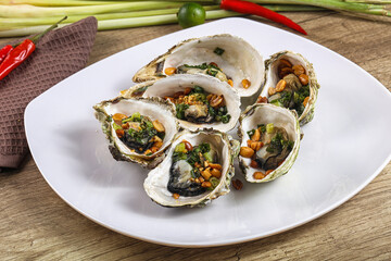 Baked oysters with green onion
