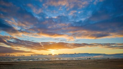 Sea coast. Different sky. Beautiful sunset.