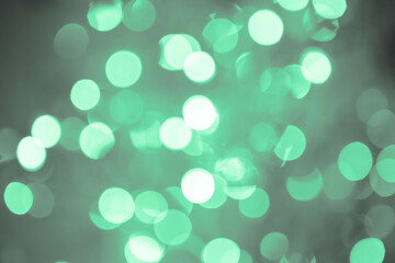 Obraz premium forest green, lime, viridian, olive, sage bokeh background with soft, circular light spots in varying sizes. The dreamy, out-of-focus effect creates an abstract, atmospheric, and versatile backdrop