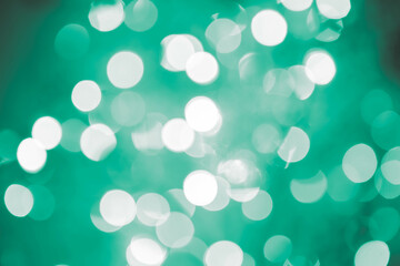 forest green, lime, viridian, olive, sage bokeh background with soft, circular light spots in varying sizes. The dreamy, out-of-focus effect creates an abstract, atmospheric, and versatile backdrop