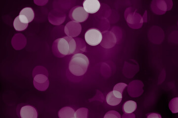 Purple, magenta, indigo bokeh background with soft, circular light spots in varying sizes. The dreamy, out-of-focus effect creates an abstract, atmospheric, and versatile backdrop