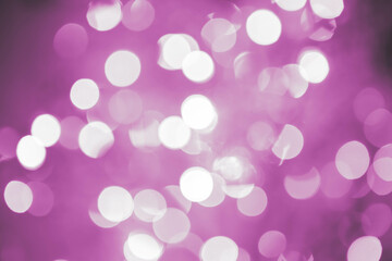 Purple, magenta, indigo bokeh background with soft, circular light spots in varying sizes. The dreamy, out-of-focus effect creates an abstract, atmospheric, and versatile backdrop