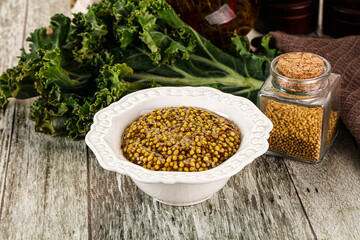 Mustard sauce with seeds in the bowl