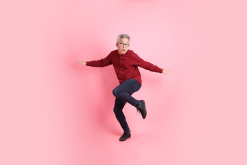 50s Man in red shirt