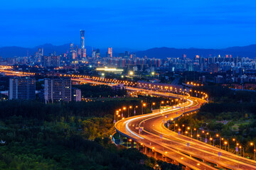 Night view of winding road to Beijing CBD area before sunrise