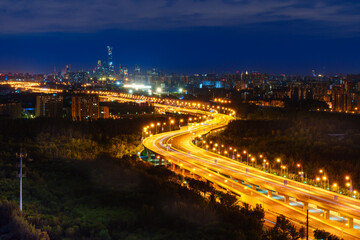 Night view of winding road to Beijing CBD area before sunrise