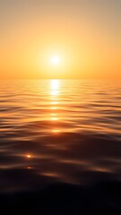 Fototapeta premium Golden Horizon with Glittering Water - Vertical Phone Wallpaper Background
