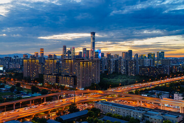 Fototapeta premium Night view of the skyline of Beijing CBD area at sunset