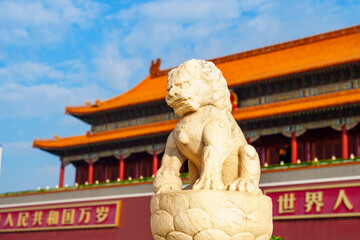 Stone lion before Tian'anmen under blue sky in Beijing, China