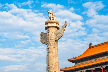 Marble pillar before Tian'anmen under blue sky in Beijing, China