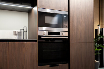 Built-in microwave and oven with touch controls and stainless finish