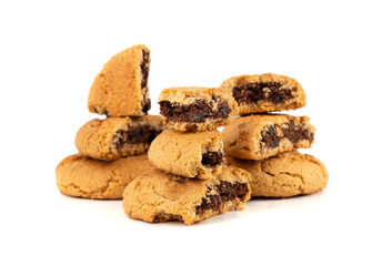 Chocolate cookies with chocolate filling isolated, brown round biscuits, broken sweet cocoa pastry