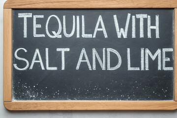 Tequila with salt and lime. On the chalkboard.