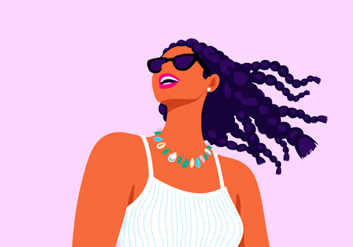 Happy woman wearing sunglasses against pink background