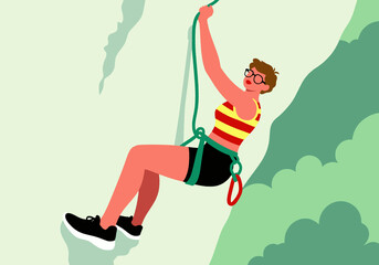 Woman wearing harness and climbing rock in forest