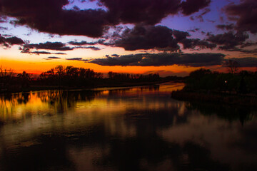 sunset colors reflection over the river