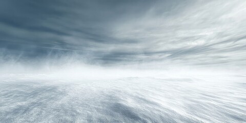 Fototapeta premium A snowstorm blowing fiercely across an empty landscape, with visibility reduced to a few feet.