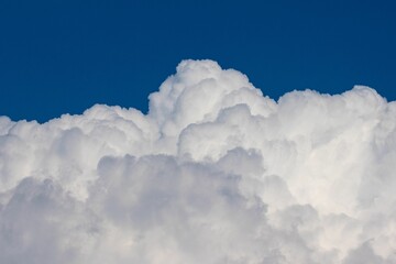 Fluffy Clouds Against a Blue Sky