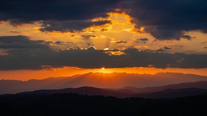 Dramatic sunset over mountain range