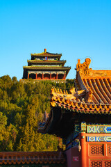 Wanchun Pavilion of Jingshan Park under blue sky in morning sunlight