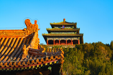Wanchun Pavilion of Jingshan Park under blue sky in morning sunlight