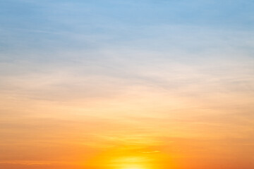 Sky,sunset, beautiful , luxury soft gradient orange gold clouds and sunlight on the blue sky perfect for the background, Sunrise on morning or everning in winter warm time ,Twilight summer,silhouette