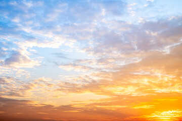Beautiful , luxury soft gradient orange gold clouds and sunlight on the blue sky perfect for the background, take in evening,Twilight, Large size, high definition landscape photo
