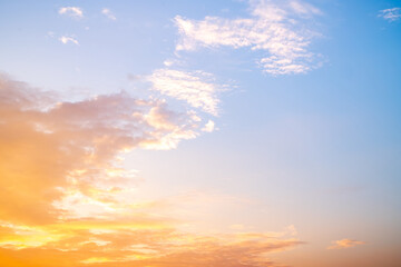 Beautiful , luxury soft gradient orange gold clouds and sunlight on the blue sky perfect for the background, take in evening,Twilight, Large size, high definition landscape photo