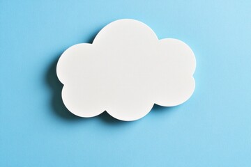 Obraz premium White Cloud Shape on Blue Background for Creative Projects and Design Concepts