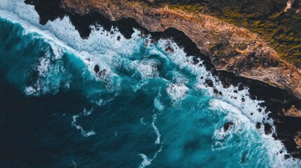 Dramatic Waves and Vibrant Colors on Rocky Shore