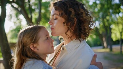 Mom daughter sunshine portrait. Loving mother small child looking camera bonding - Powered by Adobe